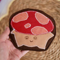 Forest Friend Chantal the Mushroom Coaster, Red and Beige on Brown Background