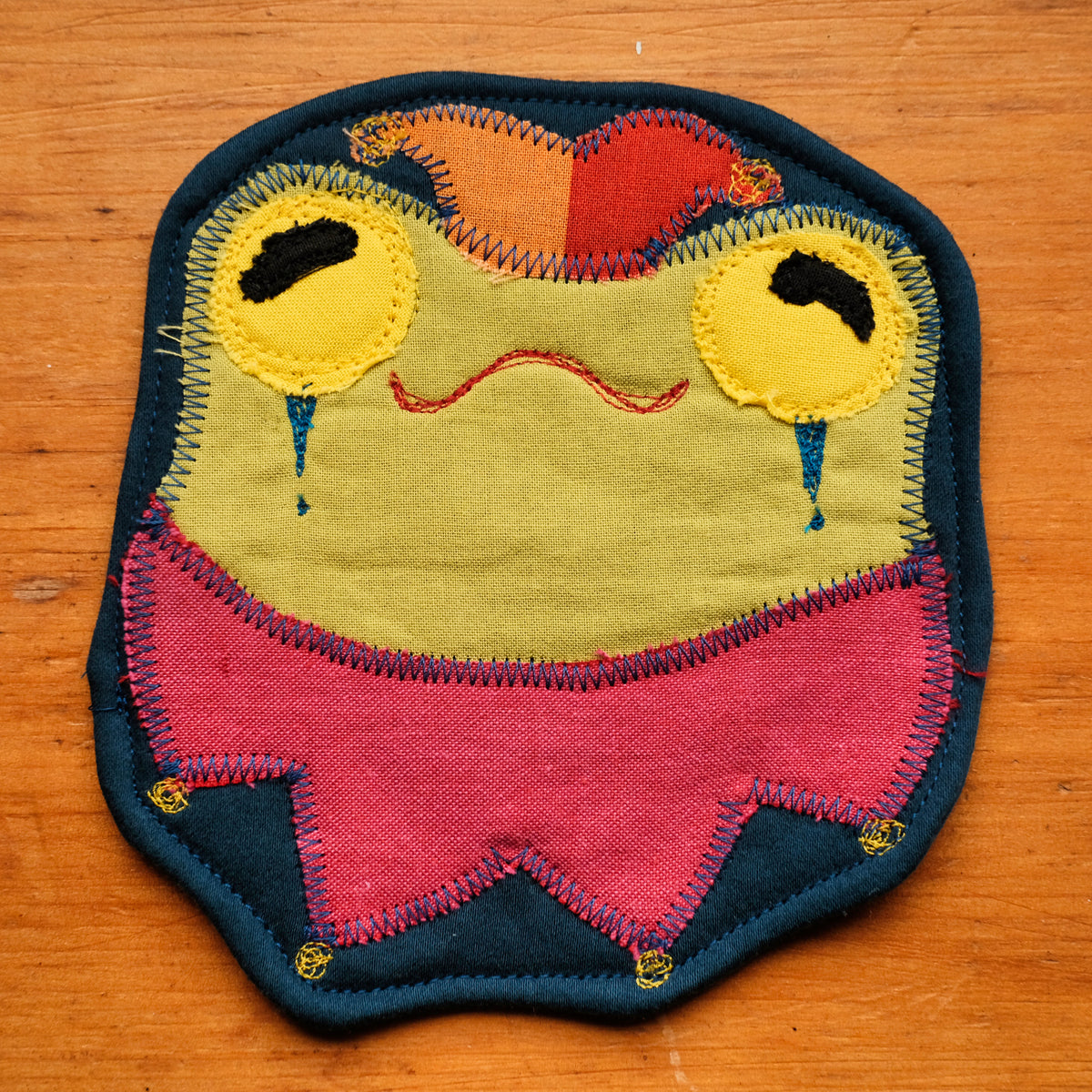 Sous-verre Clownimal Lucille la grenouille sur fond marine
