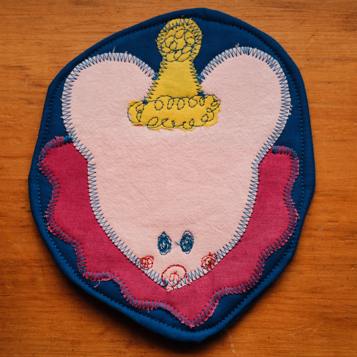 Sous-verre Clownimal Timmy la souris sur fond bleu