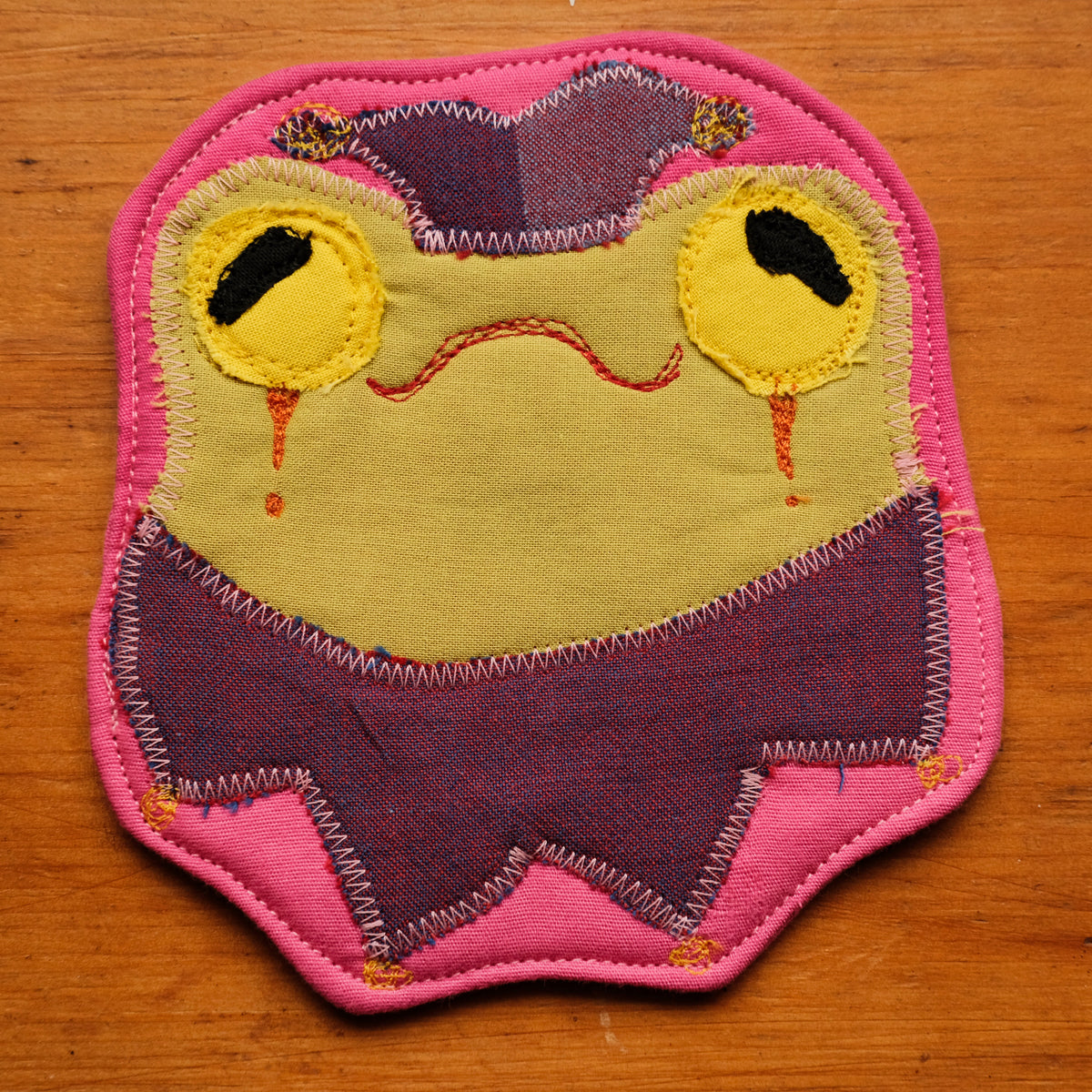 Sous-verre Clownimal Lucille la grenouille sur fond rose