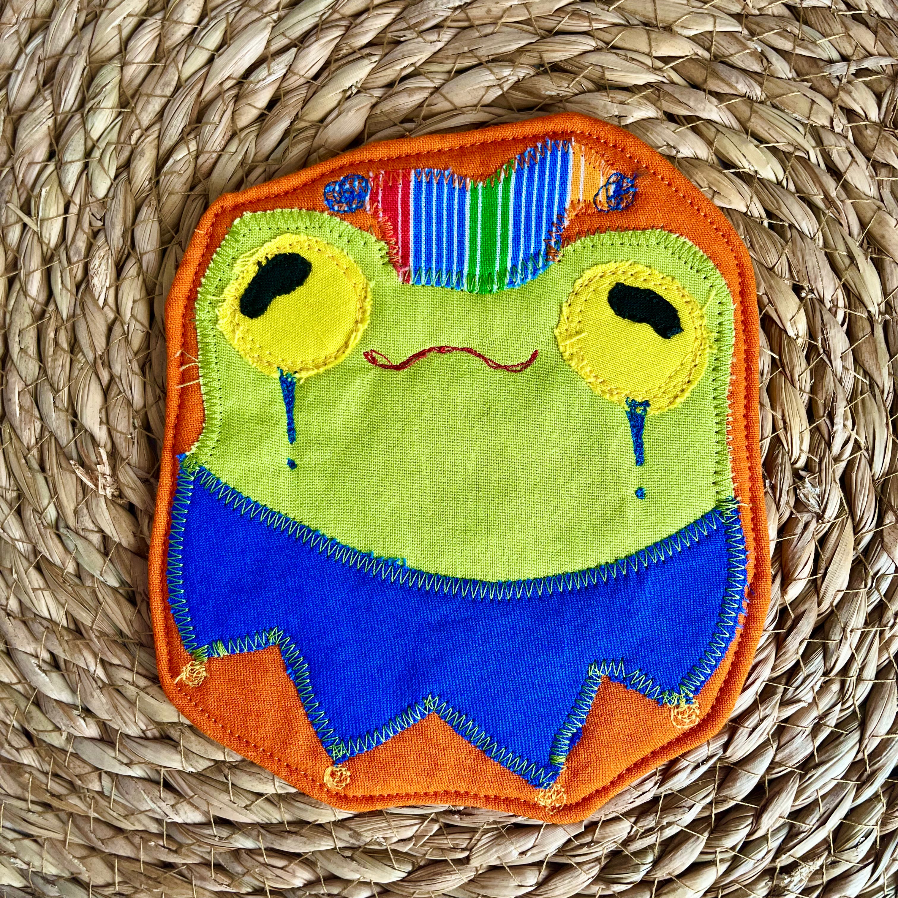 Sous-verre Clownimal Lucille la grenouille sur fond orange