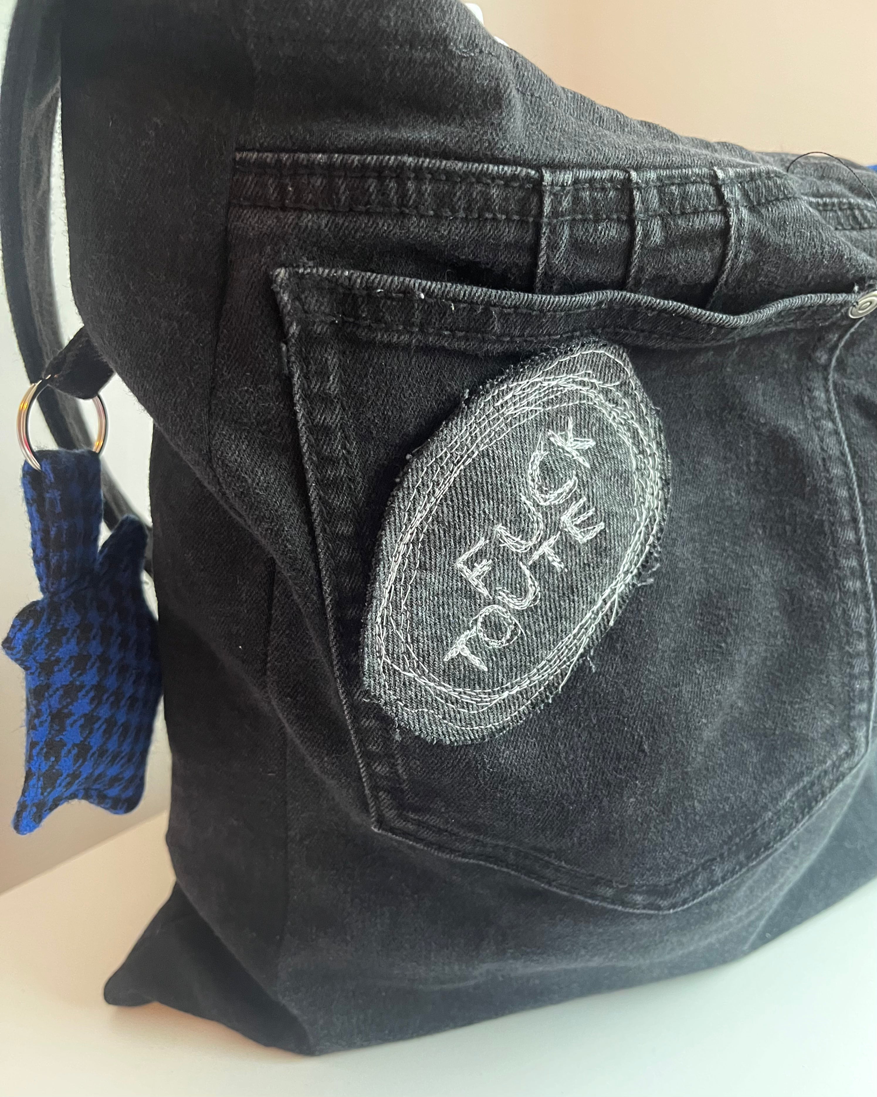 FUCK TOUTE pin, denim offcut