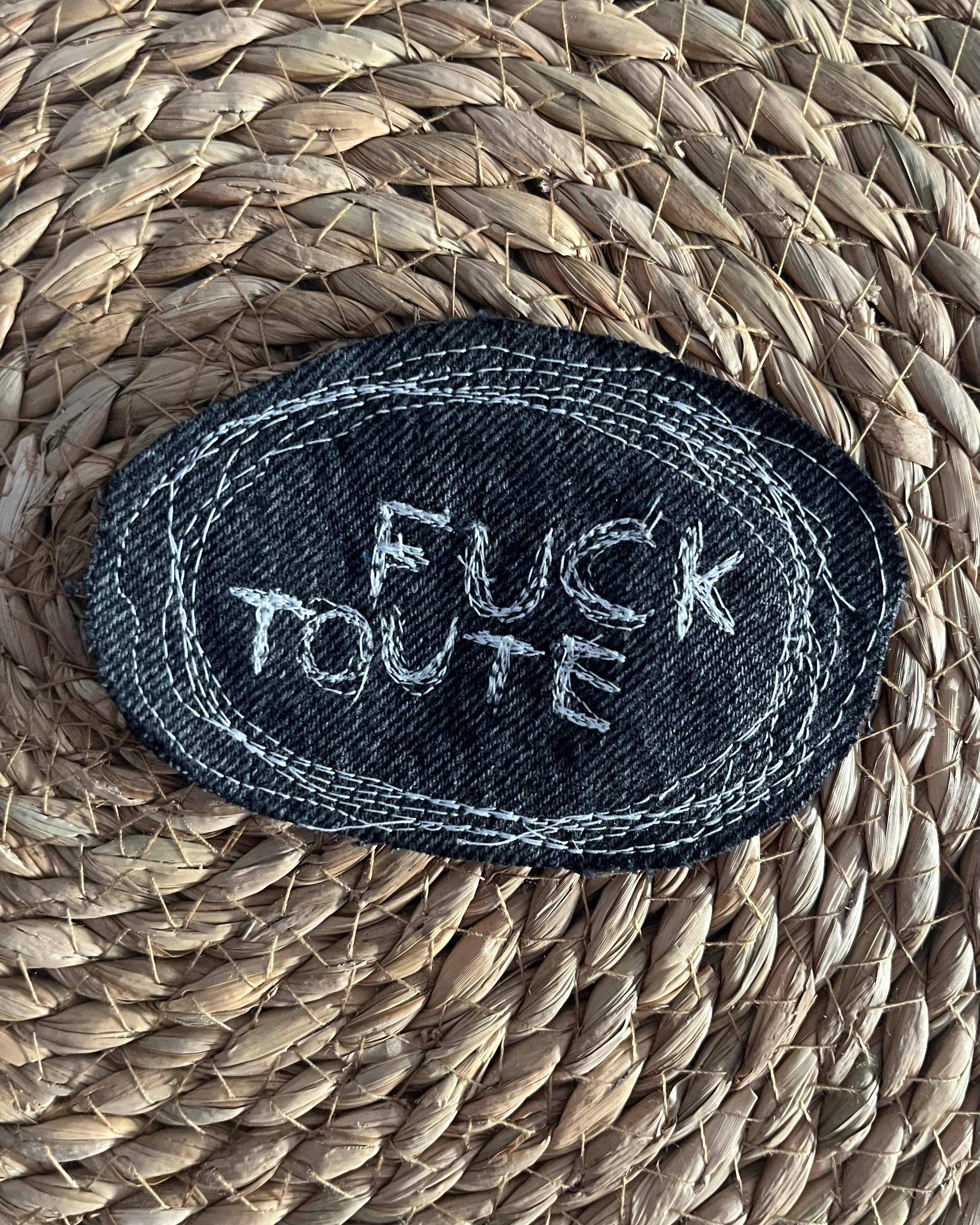 FUCK TOUTE pin, denim offcut