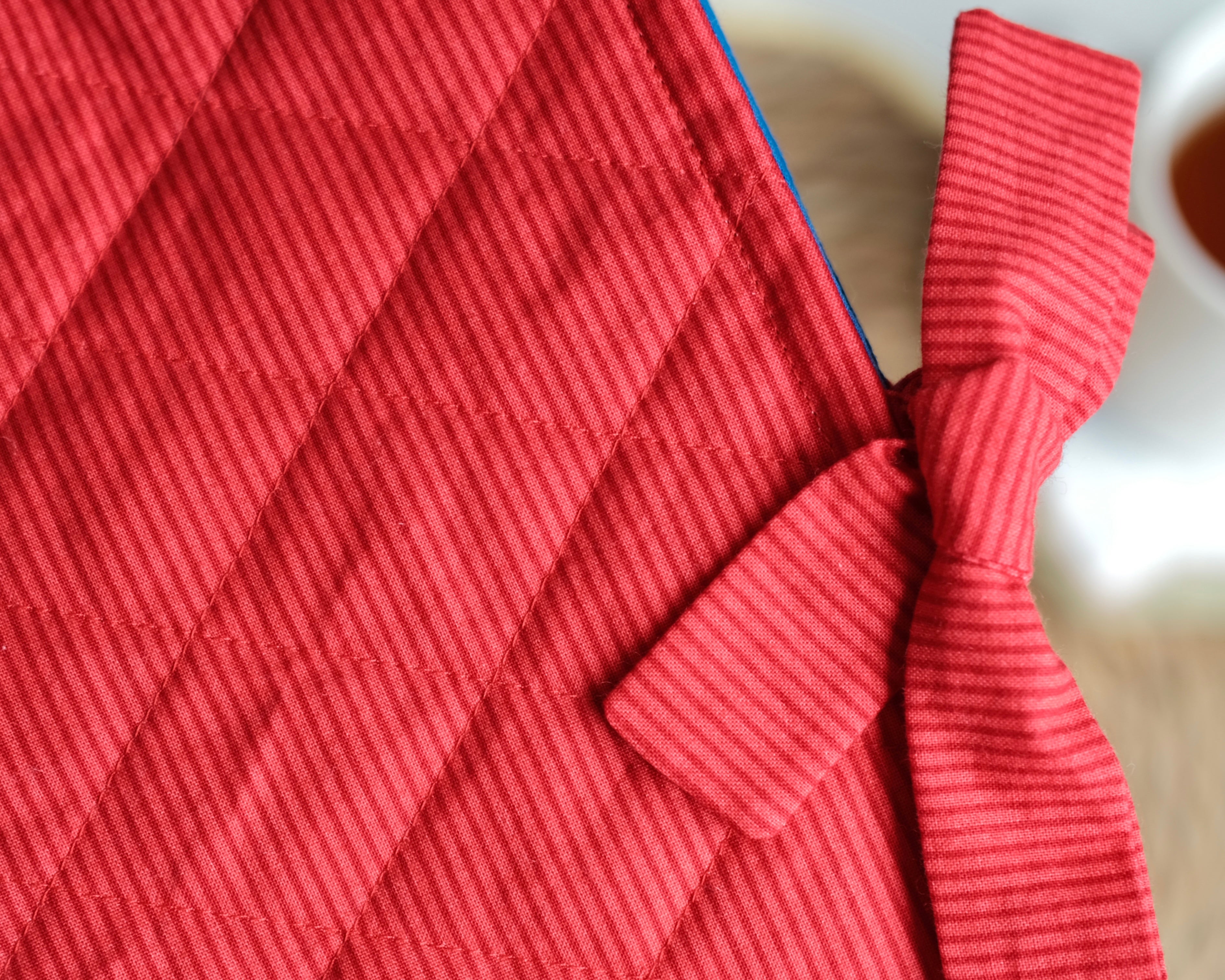 Red lined book sleeve (blue inside)