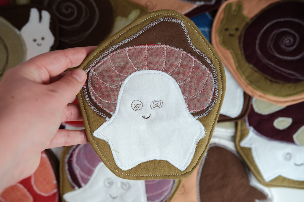 Forest Friend Marcel the Mushroom Coaster, Brown and White on Dark Green Background