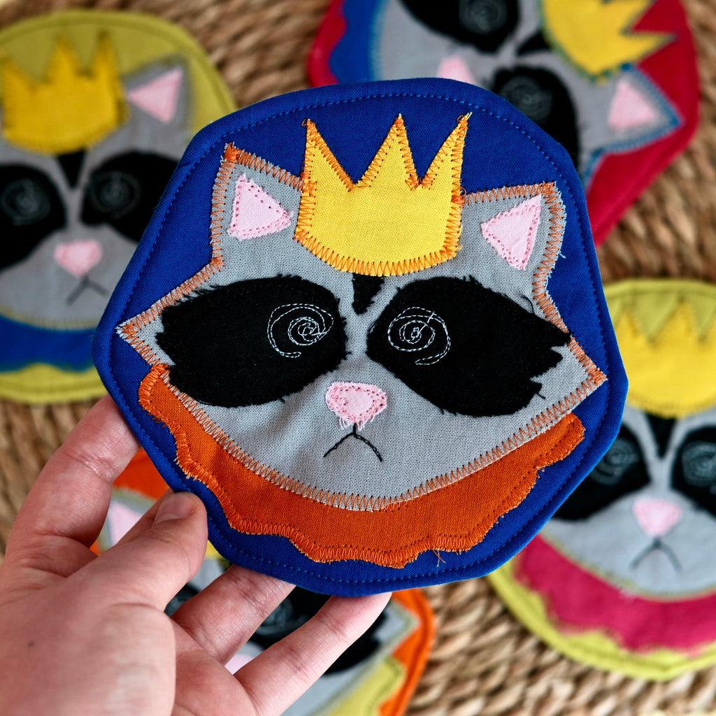 Clownimal Gaston Prince of the Dumpster Coaster, Blue Background (orange collar)