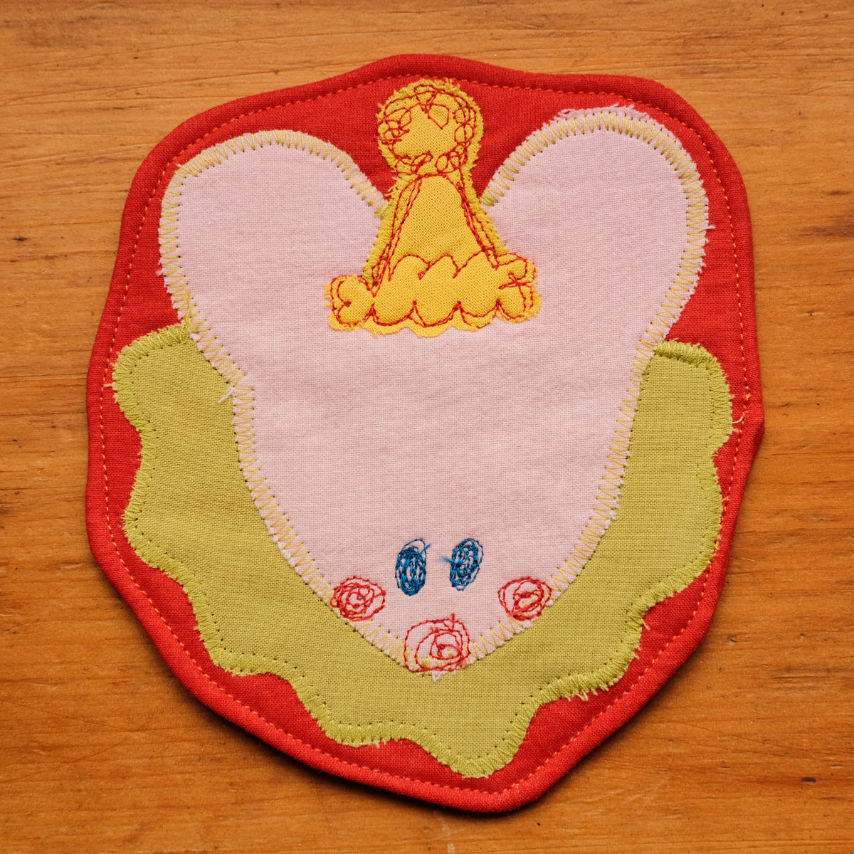 Sous-verre Clownimal Timmy la souris sur fond orange foncé